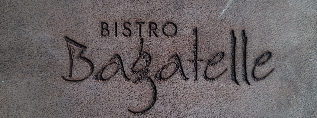 Tischdeko und Kochequipment mit Logo-Gravur, Wunschleder